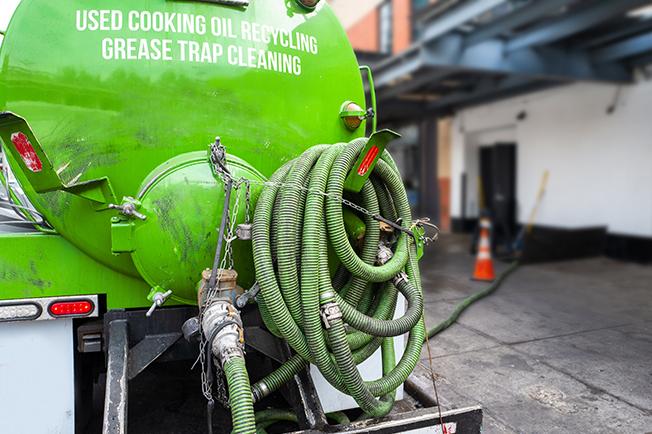 workers at Grease Trap Cleaning of Largo